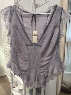 Anthropologie Women's Lace-Trim Ruffle Sleeveless Blouse.
